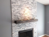 Alaska Gray Marble around fireplace stone veneer panels Fremont