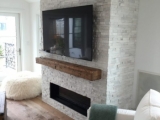 Snow White Marble Ledger Panels around fireplace Fremont