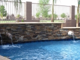 California Gold ledger stone veneer panels outdoor waterfall retaining wall