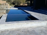 Silver travertine pavers around pool deck versailles pattern San Jose