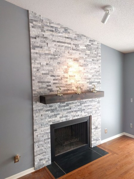 Alaska Gray Marble around fireplace stone veneer panels Fremont
