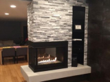 white marble graystone stacked panels on indoor fireplace tile wall